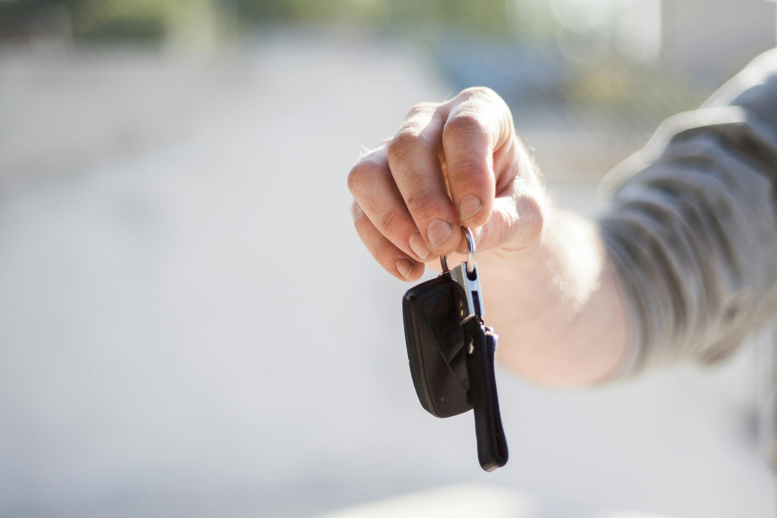A hand holding car keys after applying for vehicle finance NZ