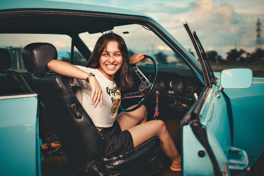 Young female driver with vehicle finance nz